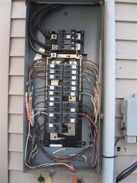 electrical wires loose inside breaker box|breakers loose in fridge panel.